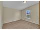 Carpeted bedroom with a neutral paint and a view of the outdoors at 162 E Abbey Ct, Smithfield, NC 27577
