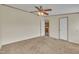 Bedroom featuring carpeted floors, a ceiling fan, and a closet at 162 E Abbey Ct, Smithfield, NC 27577