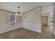 Dining room with wood floors and a chandelier light fixture at 162 E Abbey Ct, Smithfield, NC 27577