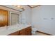 Bathroom with a double sink vanity, mirror, wallpaper, toilet and shower at 1635 Sandy Cross Rd, Burlington, NC 27217