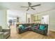 Spacious open-concept living room with hardwood floors and views of the kitchen and built-in shelving at 1900 High Oaks Ln, Raleigh, NC 27606