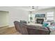 Inviting living room with a cozy fireplace, mantel decor, ample natural light, and a comfortable seating area at 1900 High Oaks Ln, Raleigh, NC 27606