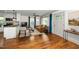 Bright living room featuring hardwood floors and a comfortable seating area at 200 Lincoln Ct, Raleigh, NC 27610