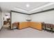 Spacious basement area with ample cabinet storage and neutral carpet at 2004 Riverview Dr, Clayton, NC 27527