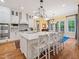 Bright, eat-in kitchen with a large island and barstool seating at 21 Kimberly Dr, Durham, NC 27707