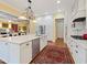 Spacious kitchen with a large island, stainless steel appliances, and white cabinetry at 21 Kimberly Dr, Durham, NC 27707