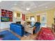 Elegant living room with a fireplace, built-in shelving, and comfortable seating areas at 21 Kimberly Dr, Durham, NC 27707