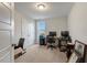 Office or spare bedroom features a built-in desk and lots of natural light at 211 Tobacco Barn Dr, Angier, NC 27501