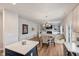 Open floor plan showcases a dining area and living room with a fireplace and built-in shelving at 211 Tobacco Barn Dr, Angier, NC 27501