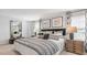 Relaxing bedroom showcasing a plush bed, contemporary artwork, and calming color scheme at 2152 Monk Dr, Haw River, NC 27258