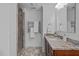 Bathroom with a vanity, sink, granite countertop, and glass enclosed shower at 2408 Merion Creek Dr, Apex, NC 27539