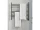 Bathroom with a heated towel rack and neutral color scheme at 2408 Merion Creek Dr, Apex, NC 27539