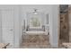 Bathroom featuring a soaking tub, tile surround, and a separate shower at 2408 Merion Creek Dr, Apex, NC 27539