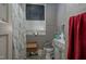 Compact bathroom featuring essential fixtures and a clean design, ideal for everyday convenience at 257 E Raleigh Blvd, Rocky Mount, NC 27801