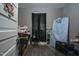 Bedroom with dark wood-look floors and a black window covering at 257 E Raleigh Blvd, Rocky Mount, NC 27801