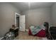 Bedroom with wood-look vinyl floors and an open doorway at 257 E Raleigh Blvd, Rocky Mount, NC 27801