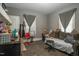 Bright living room with a cozy seating area, offering a versatile space for relaxation and entertaining at 257 E Raleigh Blvd, Rocky Mount, NC 27801