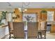 Dining room with table and chairs, seamlessly connected to the kitchen at 2604 Smoky Topaz Ln, Raleigh, NC 27610