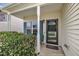 Charming front porch entrance with seating area and decorative front door at 2604 Smoky Topaz Ln, Raleigh, NC 27610