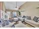 Bright living room with staircase, layered seating, and stylish decor at 2604 Smoky Topaz Ln, Raleigh, NC 27610
