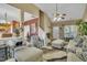 Bright living room with staircase, layered seating, and stylish decor at 2604 Smoky Topaz Ln, Raleigh, NC 27610