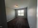 Bright bedroom with a window and carpeted floors at 27 Belmont Ct, Lillington, NC 27546