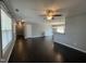 Spacious living room featuring hardwood floors and plenty of natural light at 27 Belmont Ct, Lillington, NC 27546