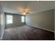 Spacious main bedroom with lots of natural light and plush carpeting at 27 Belmont Ct, Lillington, NC 27546