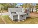 Aerial view showcasing the vinyl siding and shingled roof at 312 E Highland Ave, Rocky Mount, NC 27801
