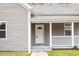 Inviting front door with a covered porch and the house number displayed prominently at 312 E Highland Ave, Rocky Mount, NC 27801