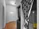Hallway displaying the washer, dryer, hot water heater, and an exterior door at 312 E Highland Ave, Rocky Mount, NC 27801