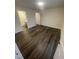 Spacious bedroom with wood-look floors and ample natural light at 3533 Ivy Commons Dr # 301, Raleigh, NC 27606