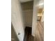 A storage closet with rod is conveniently located off the kitchen in this home at 3533 Ivy Commons Dr # 301, Raleigh, NC 27606