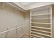 Walk-in closet with built-in shelving offers ample storage space and organization at 363 Dublin Dr, Sanford, NC 27330