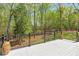 Relax on this deck overlooking the wooded property at 363 Dublin Dr, Sanford, NC 27330