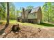 A view of the back of the house that shows a deck and a yard at 363 Dublin Dr, Sanford, NC 27330