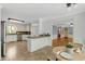 Bright kitchen featuring granite countertops, tile floors, stainless steel appliances, and white cabinets at 363 Dublin Dr, Sanford, NC 27330