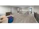 This hallway overlooks the downstairs living area and has plush carpet for comfort at 396 Martins Mill Ct, Wendell, NC 27591