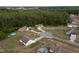 Aerial view of homes in a wooded community, each with well-maintained yards and private driveways at 40 Patricia S Vann Ct, Dunn, NC 28334