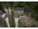 Overhead view of a house with a neatly maintained roof, landscaping, and a lengthy driveway at 40 Patricia S Vann Ct, Dunn, NC 28334