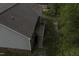 High angle captures the deck and backyard, showing the wooden deck and lawn, enveloped by lush trees at 40 Patricia S Vann Ct, Dunn, NC 28334