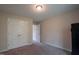 Neutral bedroom with carpet, double door closet, and lots of natural light at 40 Patricia S Vann Ct, Dunn, NC 28334