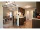 Open kitchen flows into the living room with bar stool seating and stainless steel appliances at 40 Patricia S Vann Ct, Dunn, NC 28334