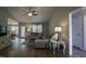 Cozy living room showcasing hardwood floors, a vaulted ceiling, and ample lighting at 40 Patricia S Vann Ct, Dunn, NC 28334