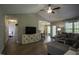 Open concept living room with vaulted ceiling and hardwood flooring at 40 Patricia S Vann Ct, Dunn, NC 28334