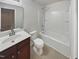 This bathroom features a vanity with a sink, a toilet, and a shower-tub combo at 400 Collington Dr, Mebane, NC 27302