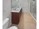Bright bathroom featuring double sinks, sleek fixtures, and a glass-enclosed shower for a spa-like experience at 400 Collington Dr, Mebane, NC 27302