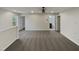 Spacious living room with neutral carpet, a ceiling fan, and doorways to adjacent rooms at 400 Collington Dr, Mebane, NC 27302