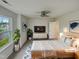 Bright main bedroom with a comfortable bed, sleek furniture, and ample natural light from the window at 400 Collington Dr, Mebane, NC 27302