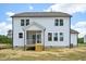 The home has a spacious backyard featuring a two-story home with a screened porch at 420 Shelby Meadow Ln, Angier, NC 27501